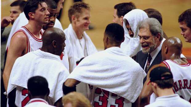 April 8, 1998; Chicago Bulls coach Phil Jackson with Scott Burrell Scottie Pippen, Michael Jordan, Toni Kukoc, Dickey Simpkins, Steve Kerr and Dennis Rodman